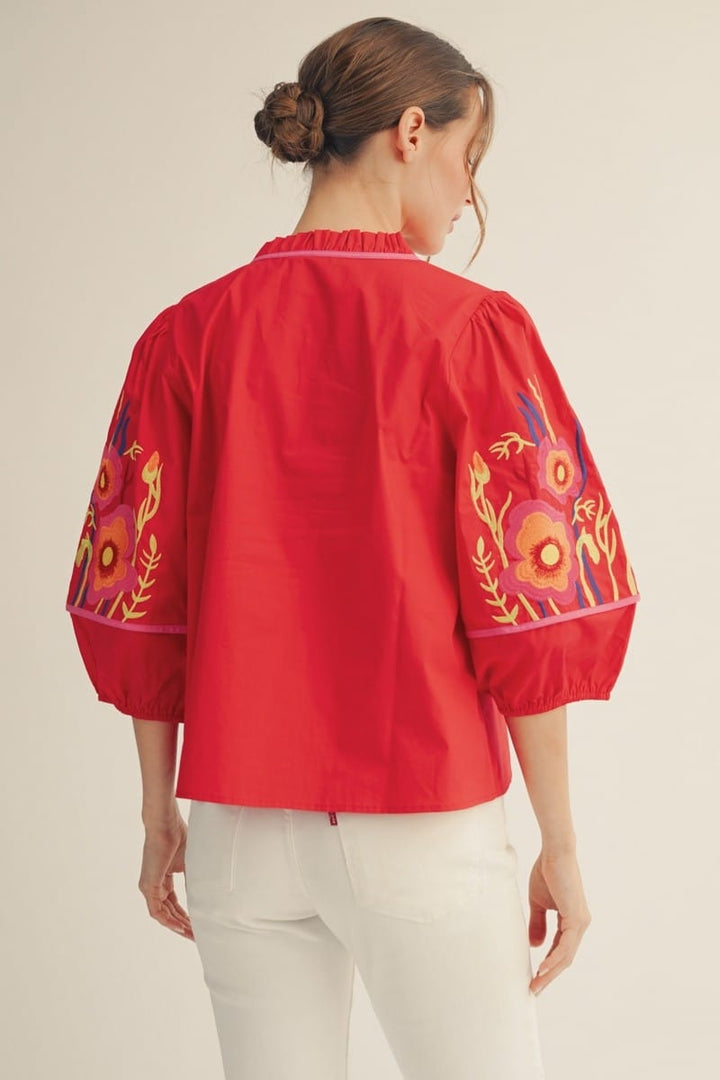 Jodifl Jillian embroidered top featuring intricate floral embroidery and a relaxed fit, shown on a model.