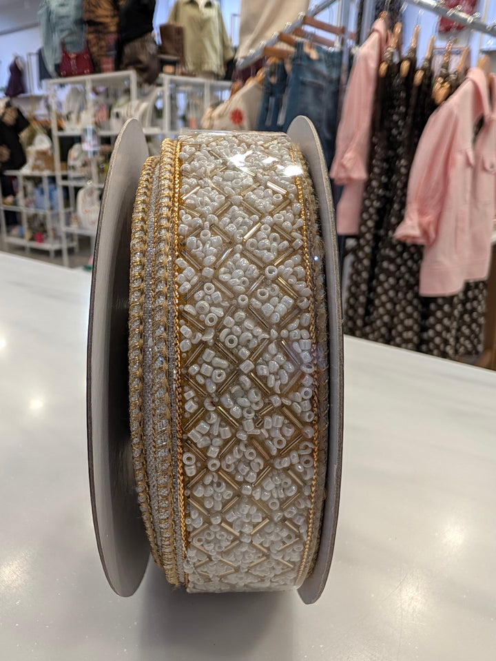 Beaded metallic ivory and gold decorative ribbon by John Mark Enterprises, perfect for elegant home decor.
