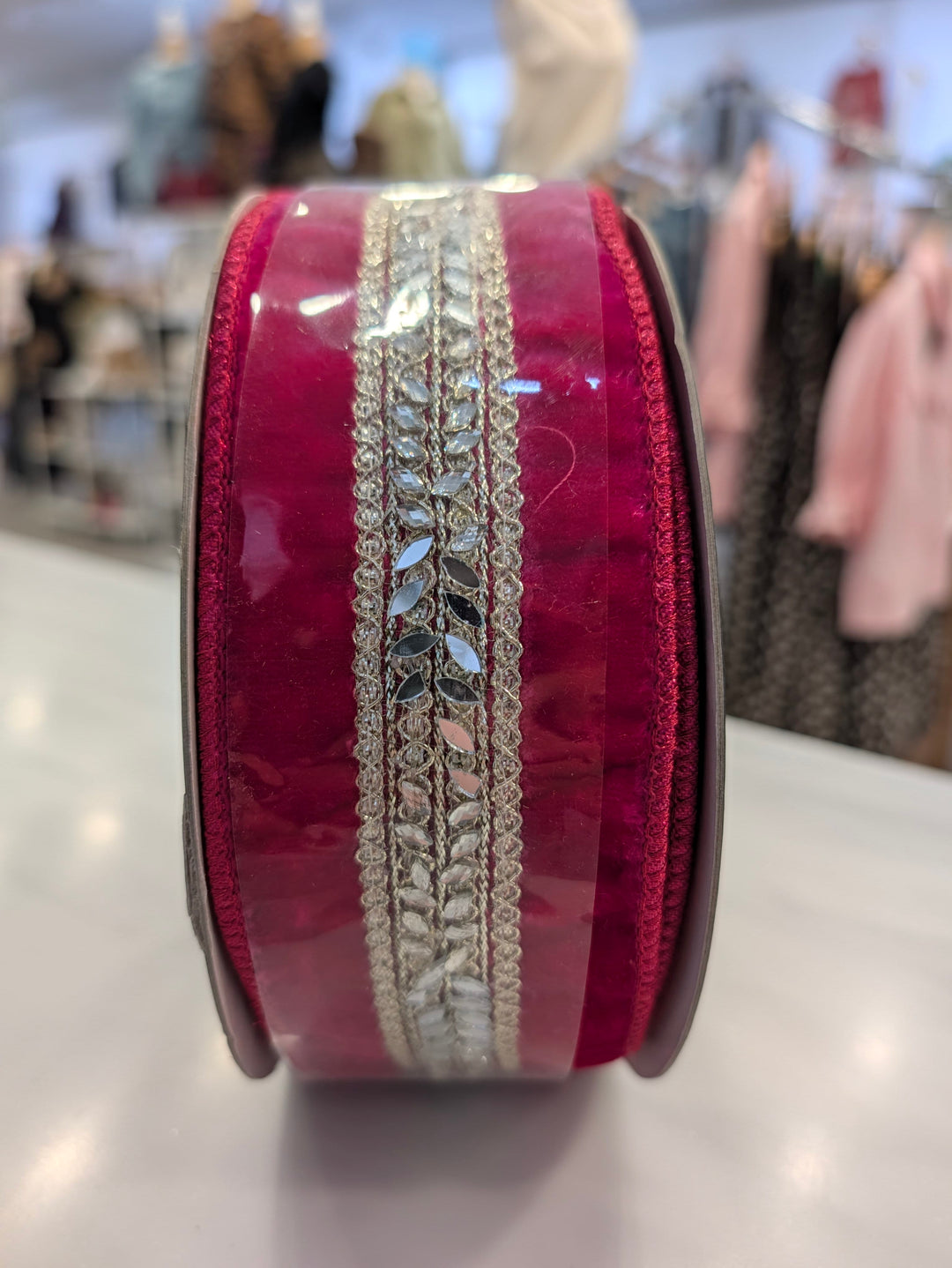 Fuchsia velvet decor ribbon by John Mark Enterprises with jeweled center, elegant and decorative for craft or gift wrapping.