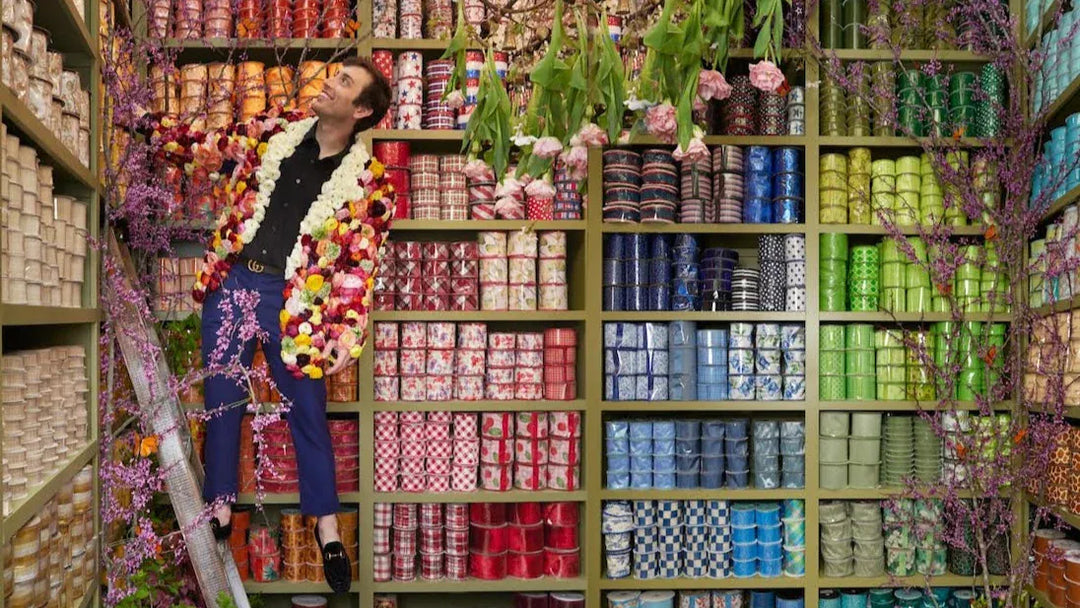 Decor ribbon by John Mark Enterprises featuring colorful, textured fabric suitable for gift wrapping and craft projects.