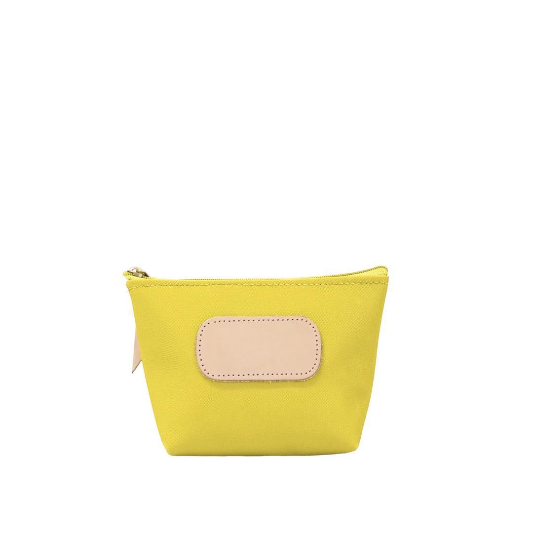 Jon Hart Design Chico Zip Bag made of lemon-coated canvas, featuring a compact bag with a zipper closure.