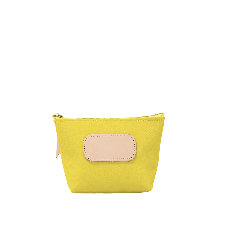 Jon Hart Design Chico Zip Bag made of lemon-coated canvas, featuring a compact bag with a zipper closure.