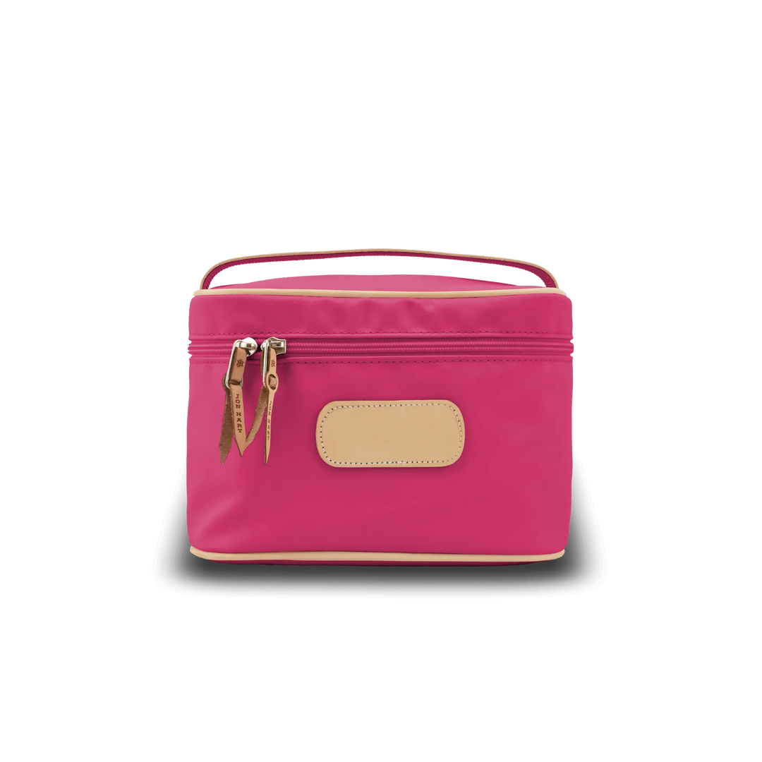 Jon Hart Design makeup bag in berry-coated canvas, compact makeup case with zipper closure and structured design.