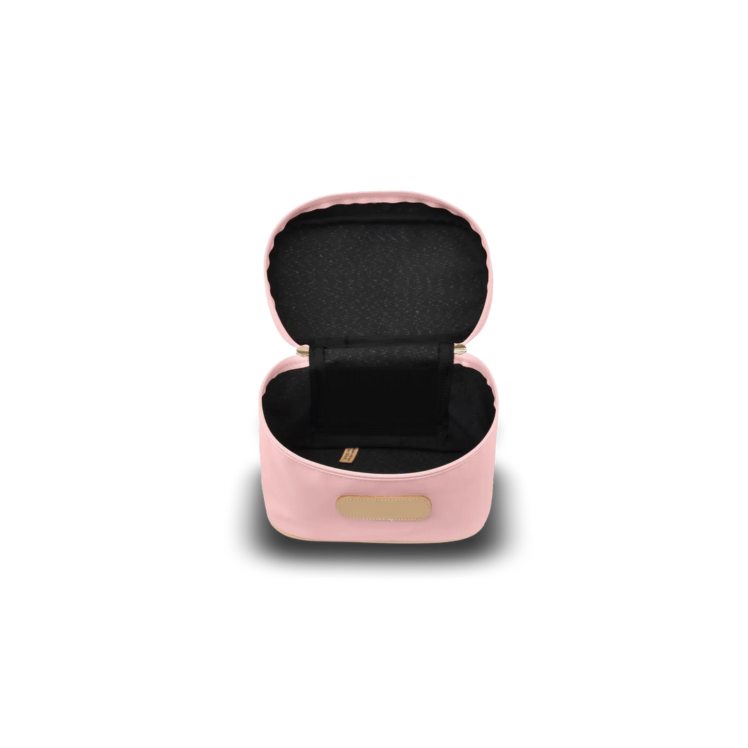 Jon Hart Design makeup case, a stylish makeup bag with a sleek exterior, ideal for organizing cosmetics on the go.