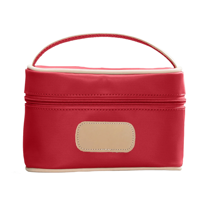 Red-coated canvas Jon Hart Design mini makeup case, compact makeup bag with zipper closure and stylish design.