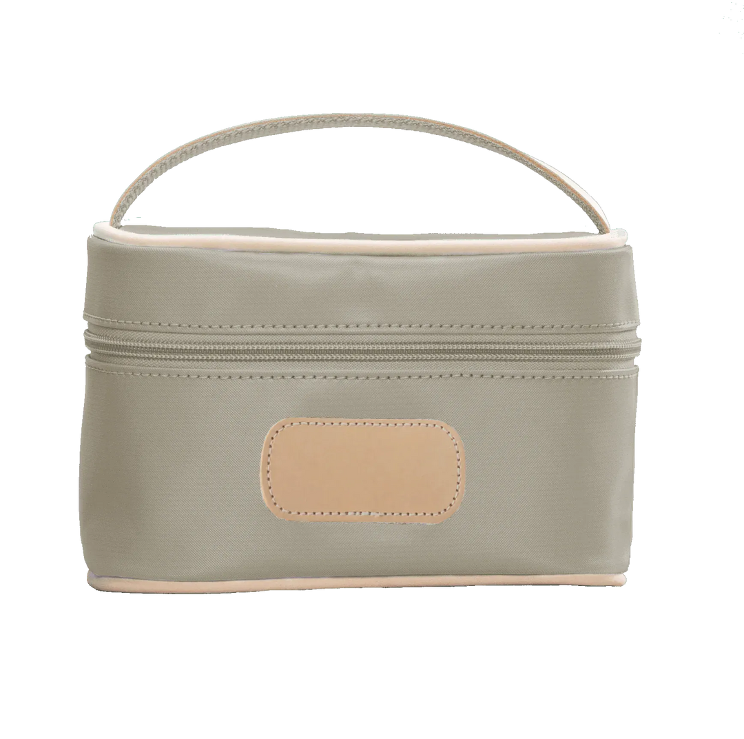 Jon Hart Mini Makeup Case in tan-coated canvas, compact makeup bag with zipper closure for cosmetics and accessories.