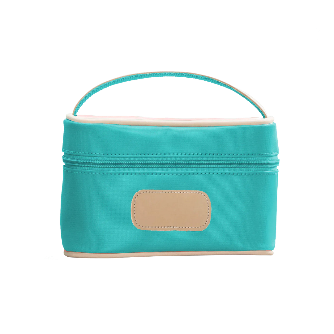 Jon Hart Mini Makeup Case made of teal-coated canvas, compact makeup bag with a zipper closure by Jon Hart Design.