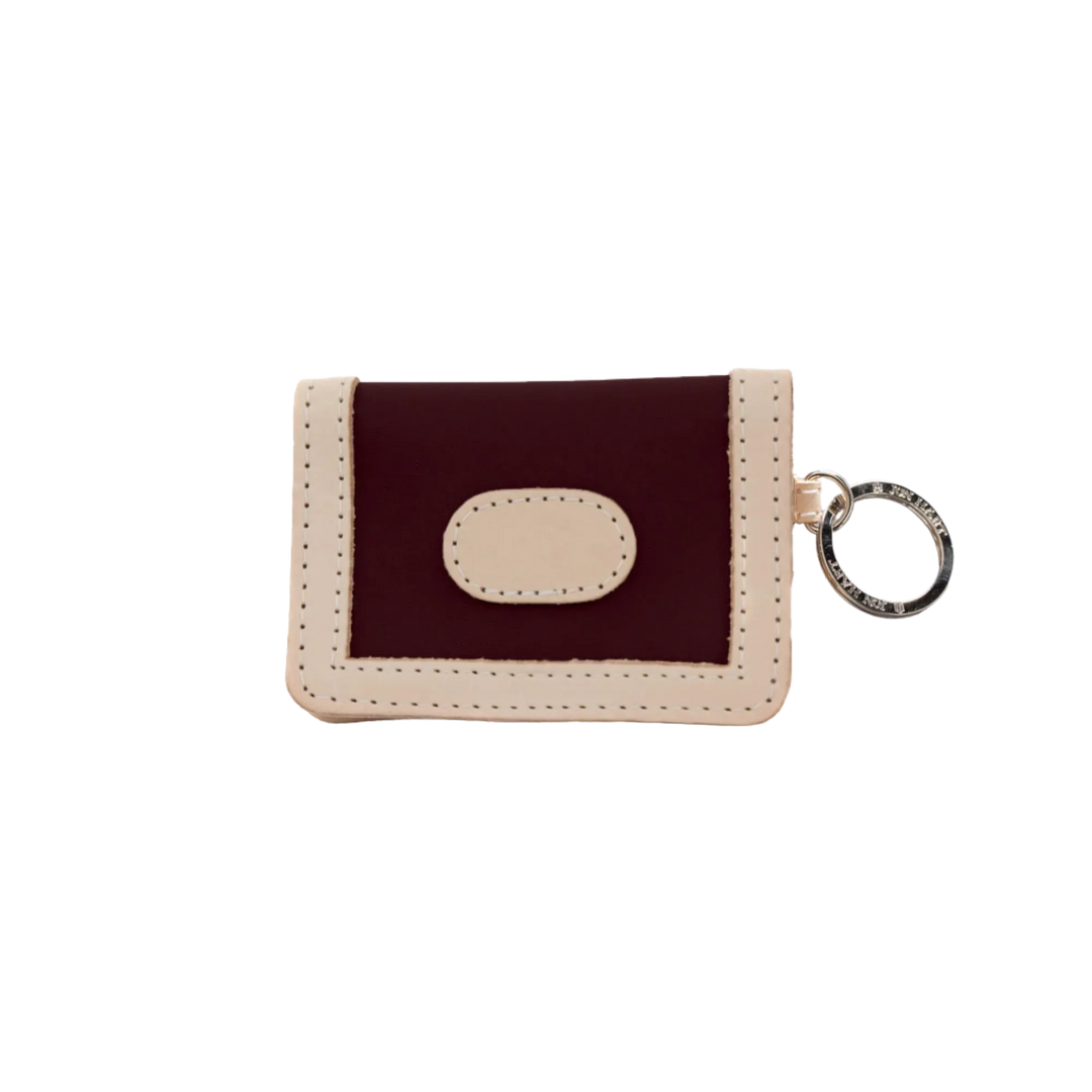 Jon Hart Design burgundy coated canvas ID wallet with multiple card slots and a transparent ID window.