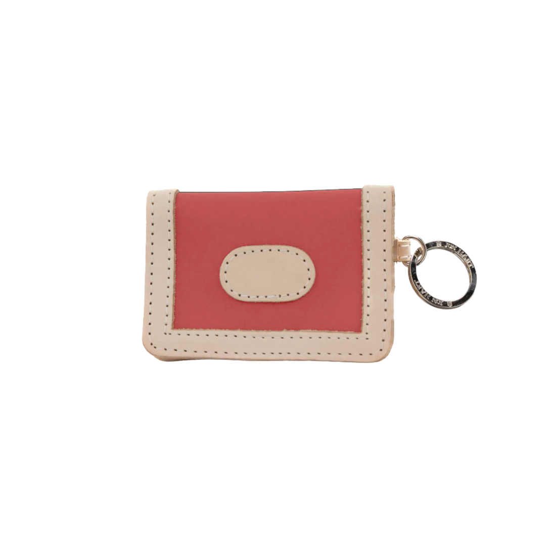 Jon Hart Design ID wallet in coral-coated canvas showing multiple card slots and compact wallet design.