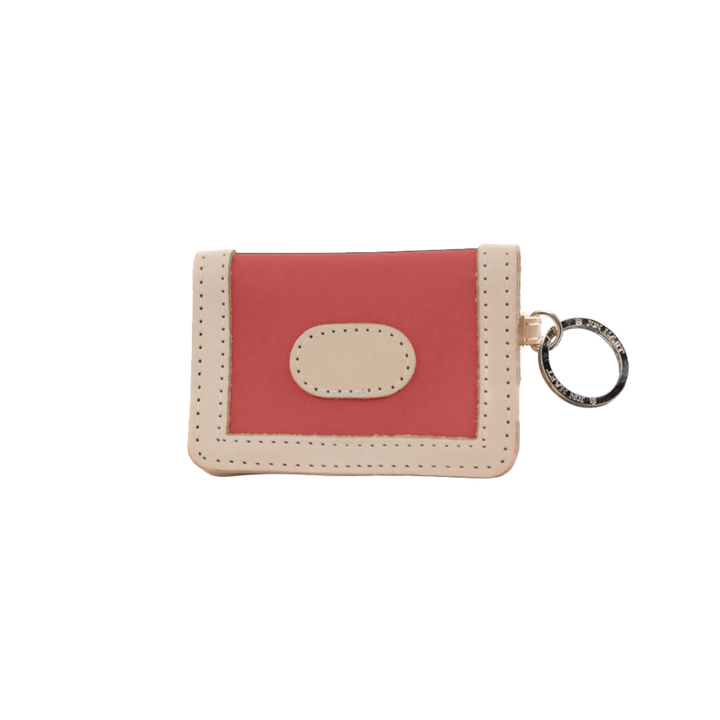 Jon Hart Design ID wallet in coral-coated canvas showing multiple card slots and compact wallet design.