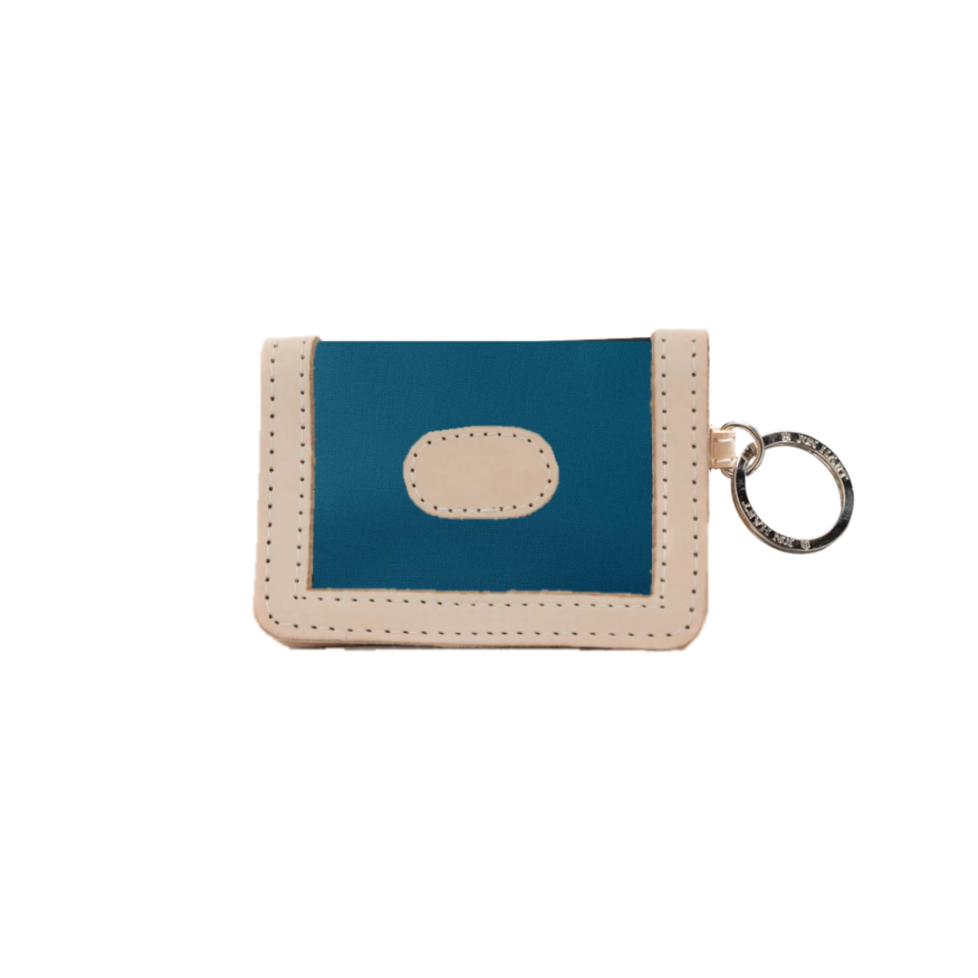 Jon Hart Design ID wallet made of French blue-coated canvas with multiple card slots and a secure ID window.