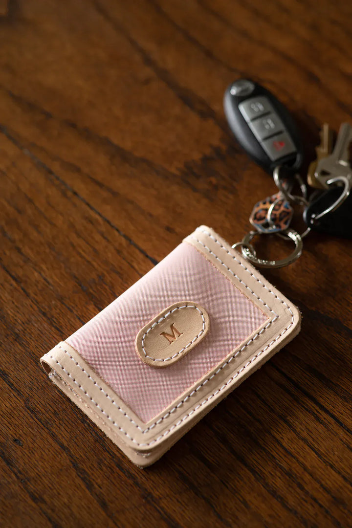 Jon Hart Design ID wallet showing multiple card slots and a clear ID window with stylish leather detailing.