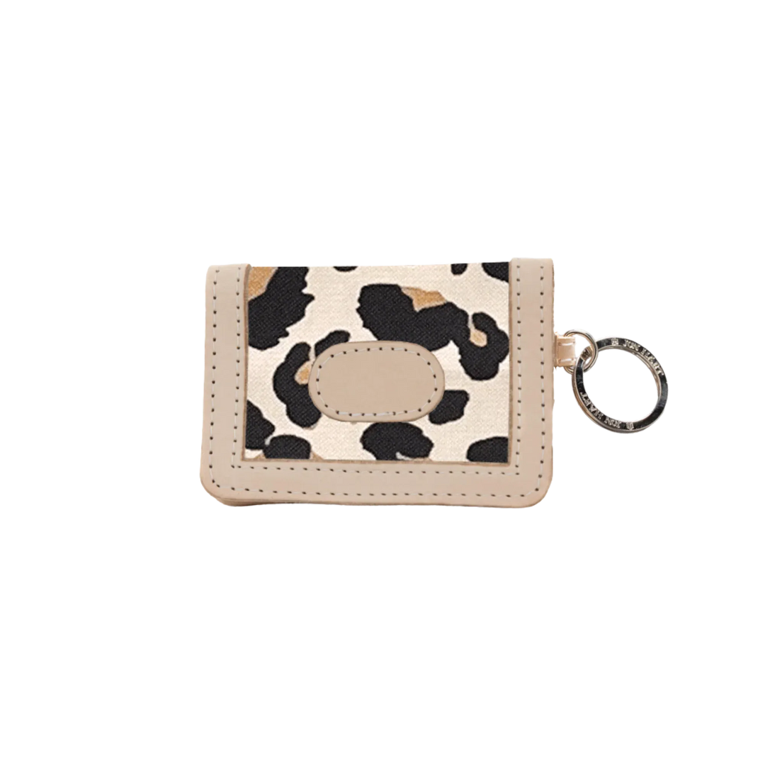 Jon Hart Design ID wallet made of leopard-coated canvas, featuring multiple card slots and a secure ID window.