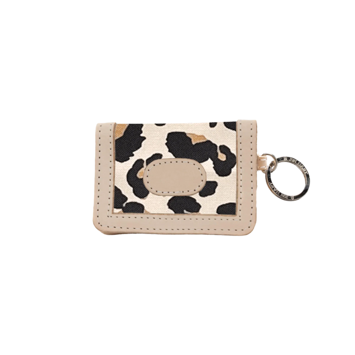 Jon Hart Design ID wallet made of leopard-coated canvas, featuring multiple card slots and a secure ID window.