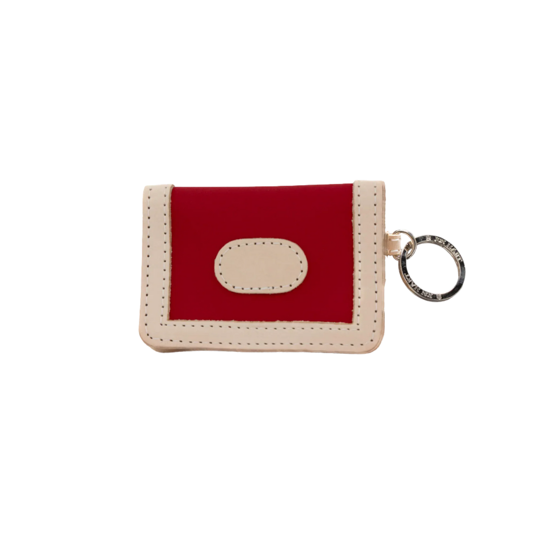 Red-coated canvas Jon Hart ID wallet with multiple card slots and clear ID window from Jon Hart Design.