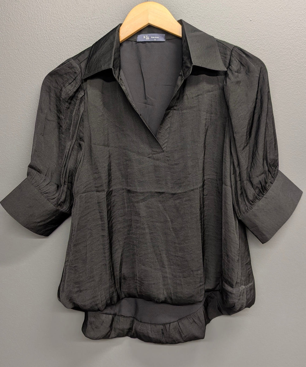 Black Journi Bubble Top by KLd. Signature featuring a fitted, textured fabric design, styled as a trendy women's sleeveless top.