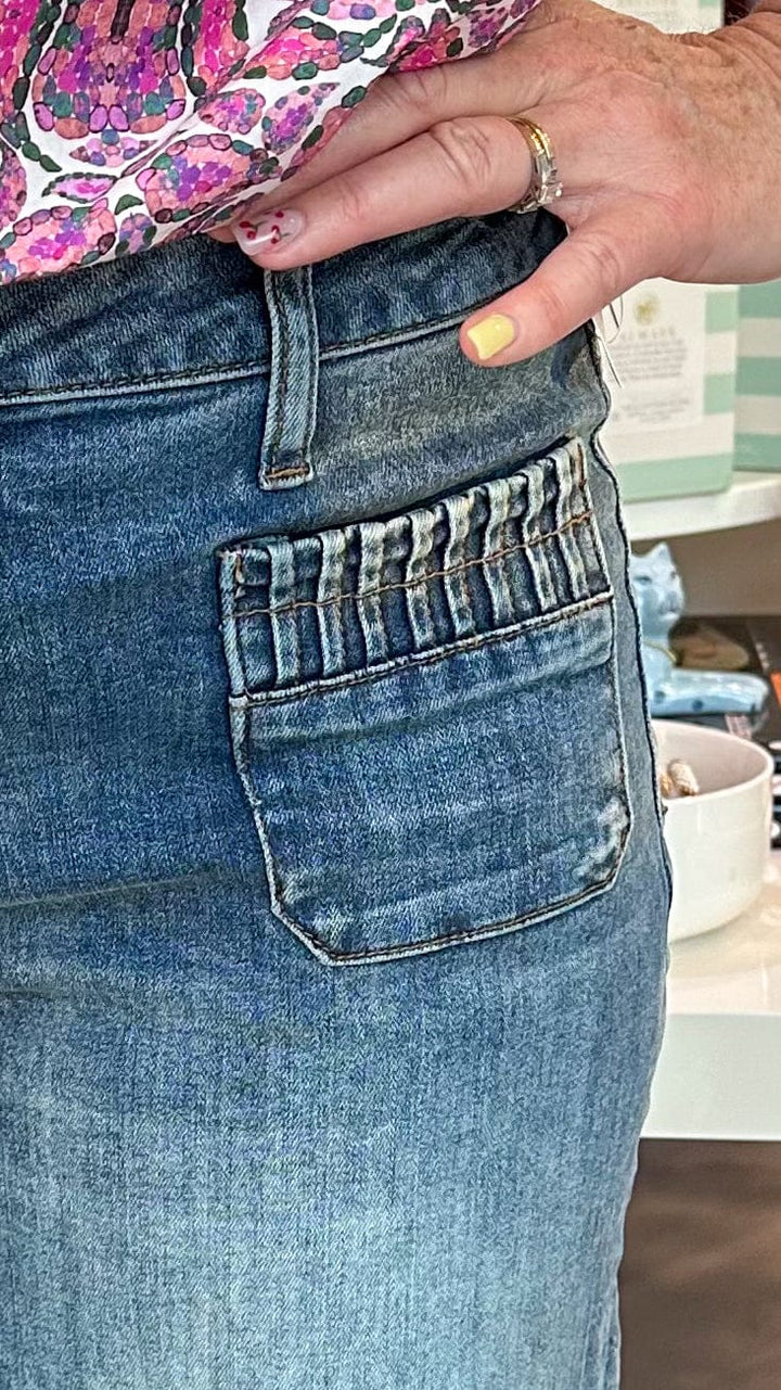 KUT from the Kloth Maya High Rise Wide Leg denim jeans, front view showing high waist and wide-leg fit.