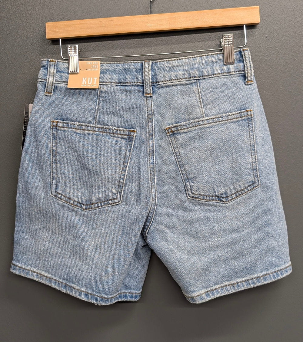 KUT from the Kloth Jane High Rise Long Denim Shorts with frayed hem and 5-pocket design, styled for casual summer wear.
