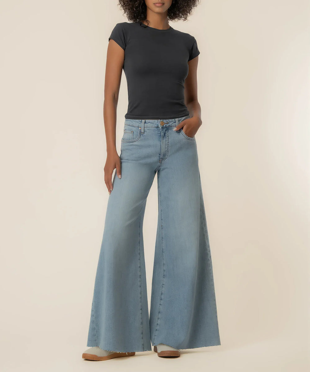 Light blue KUT from the Kloth Blake High Rise Super Wide Leg denim jeans with a relaxed fit and wide-leg silhouette.
