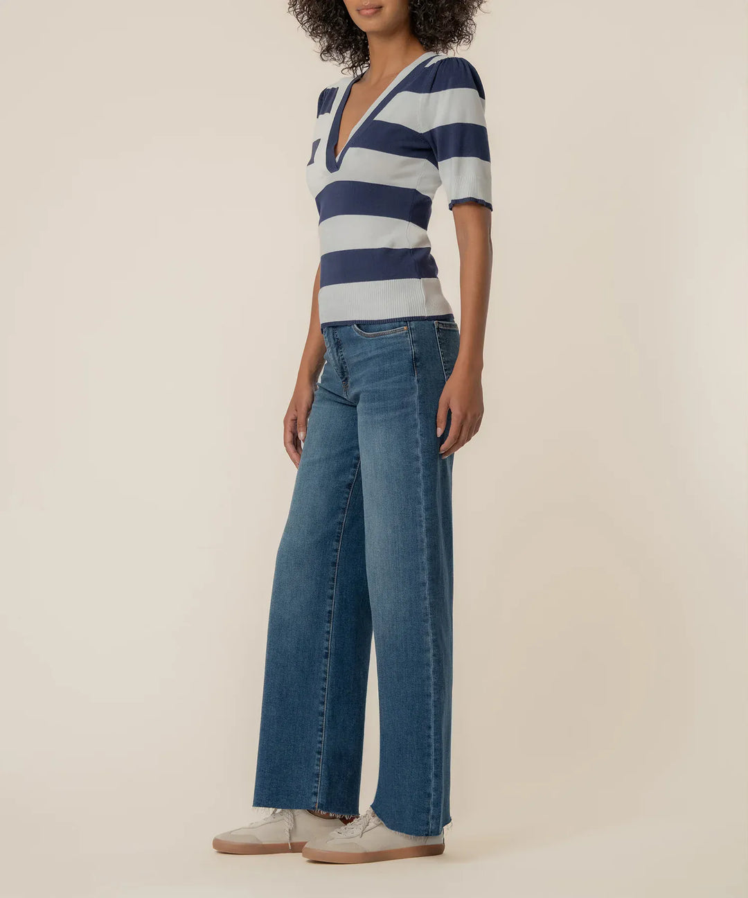 KUT from the Kloth Yona striped knit sweater with long sleeves and a cozy, casual design in various colors.