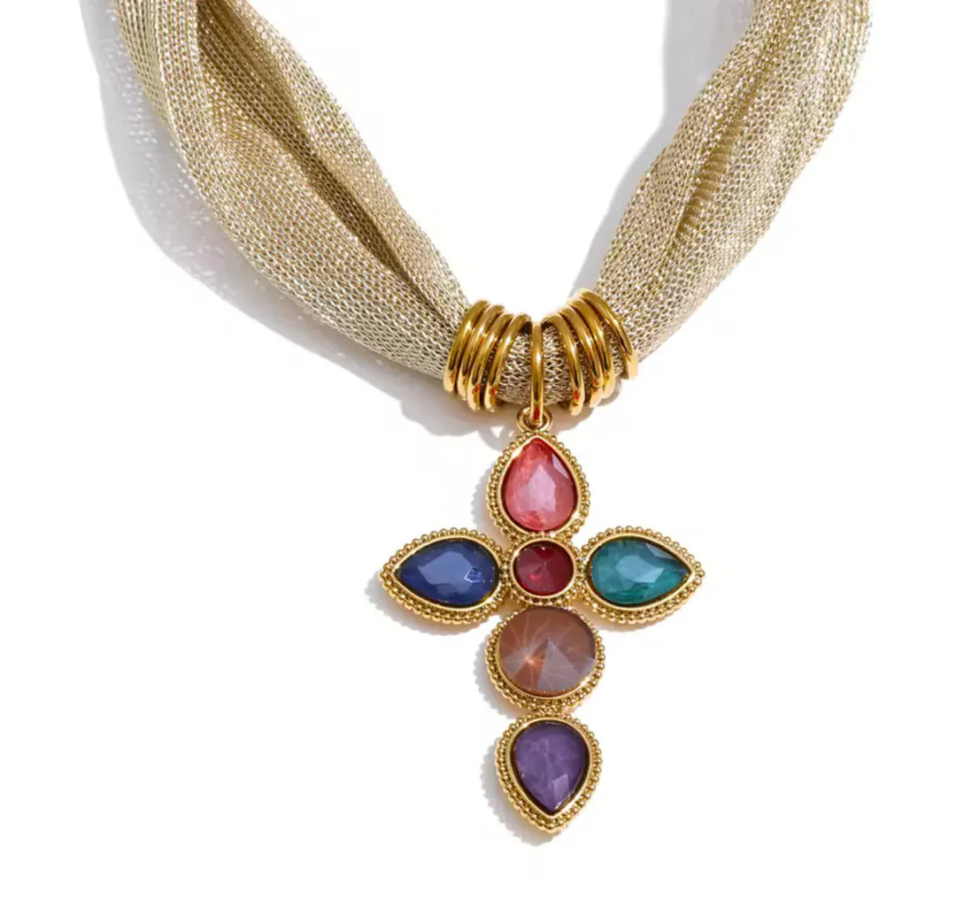 Lauren Kenzie Beatrice Cross Necklace featuring a delicate cross pendant on a sleek chain.