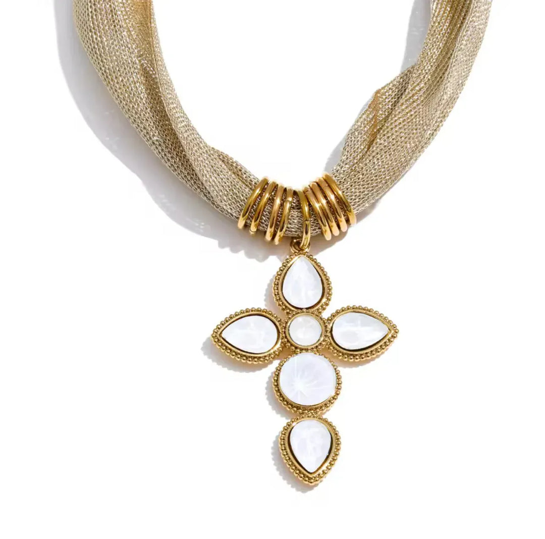 Lauren Kenzie Jolinda Cross Necklace featuring a delicate chain and cross pendant, styled for a chic, everyday look.