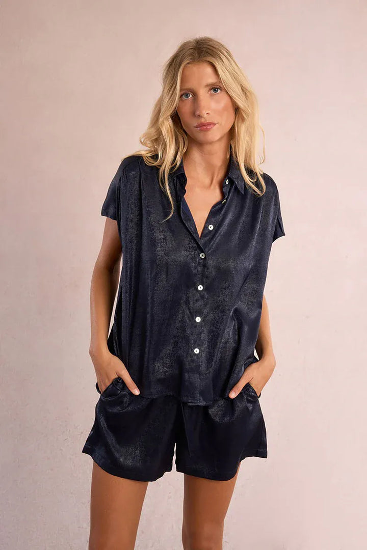Navy blue Camila satin top by Le Soir par Molly Bracken, showing the front view with a fitted design and smooth fabric.