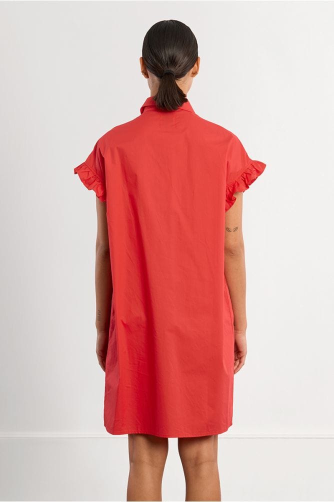 Lili Sidonio Nikki Shirt Dress displayed on a mannequin, featuring a button-up front, collar, and relaxed fit fabric.