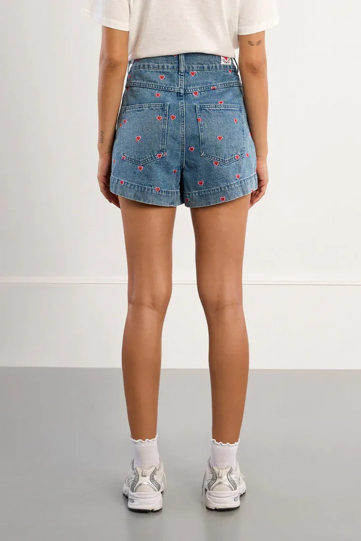 Lili Sidonio Hanna Multi-Hearts Shorts featuring colorful heart patterns and a comfortable fit.