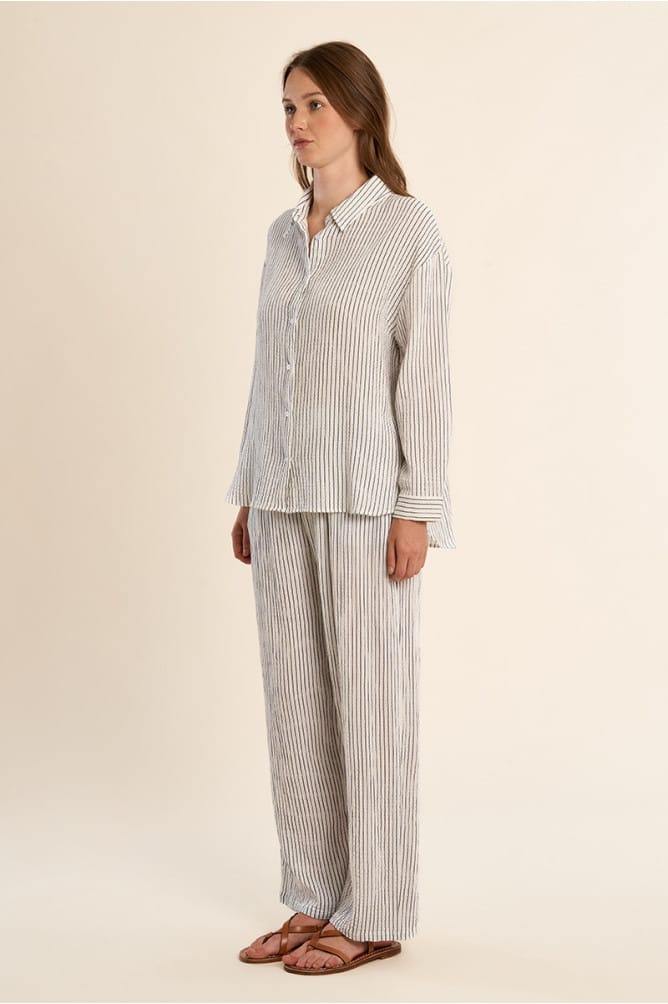 Lili Sidonio Diana oversized striped top featuring bold horizontal black and white stripes and a relaxed fit.