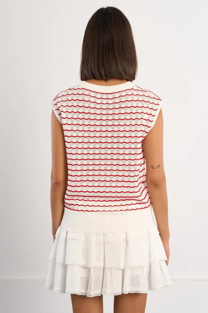 Lili Sidonio Elsie striped sweater top with long sleeves and cozy knit fabric, featuring horizontal blue and white stripes.