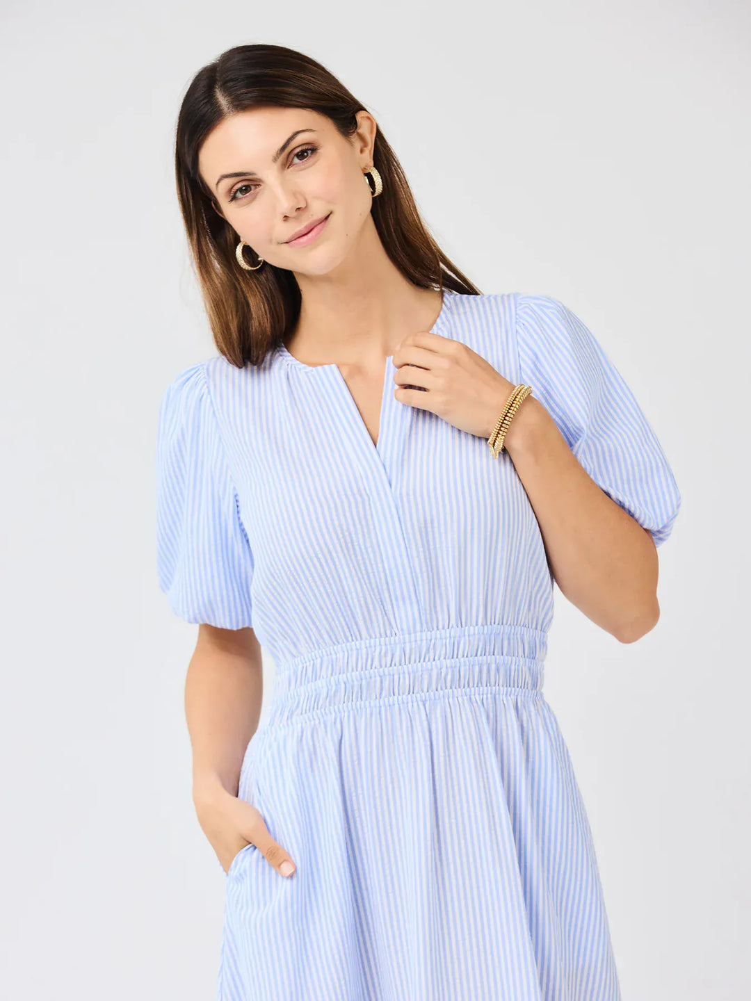 Mary Square Tracey Maxi Dress showing a flowy, floral design with a V-neck and sleeveless style on a model.