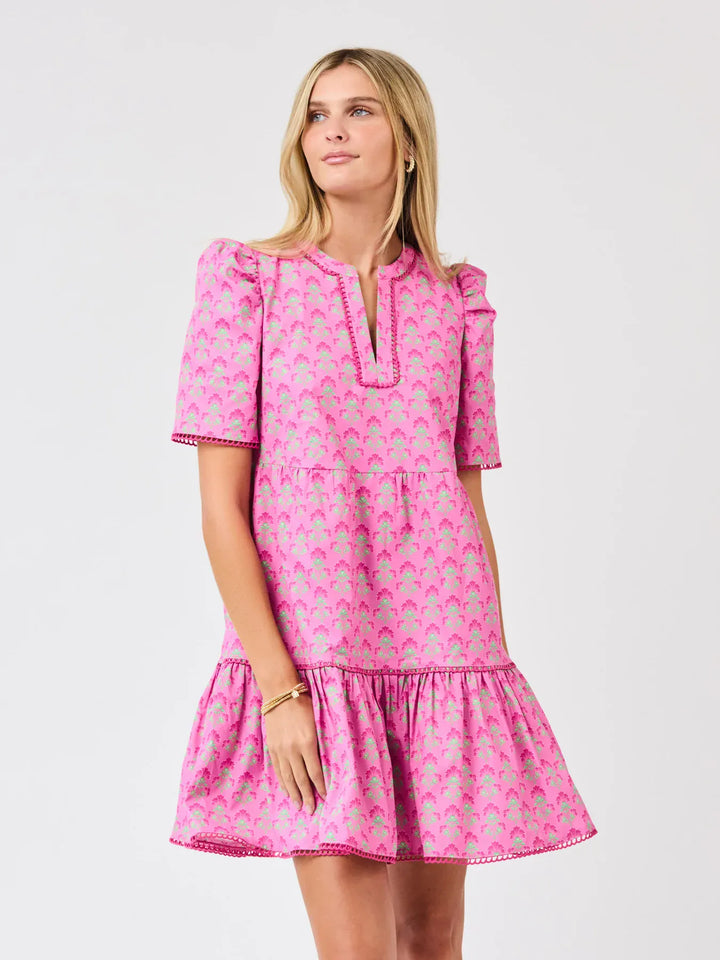 Mary Square Adelyn Midi Dress displayed on a hanger, featuring a flowy fabric and elegant design for stylish occasions.