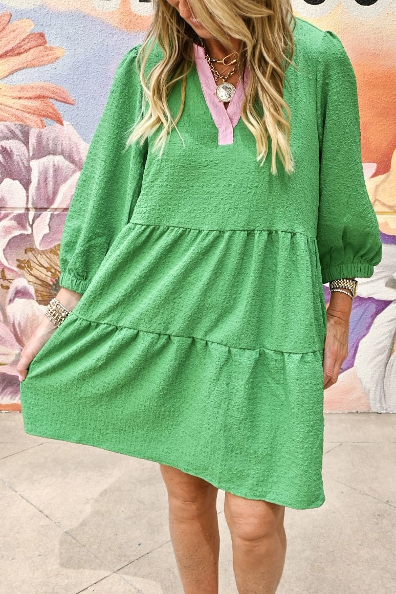 Mary Square Cooper midi dress featuring a stylish, flowy design with a fitted waist and elegant floral pattern.