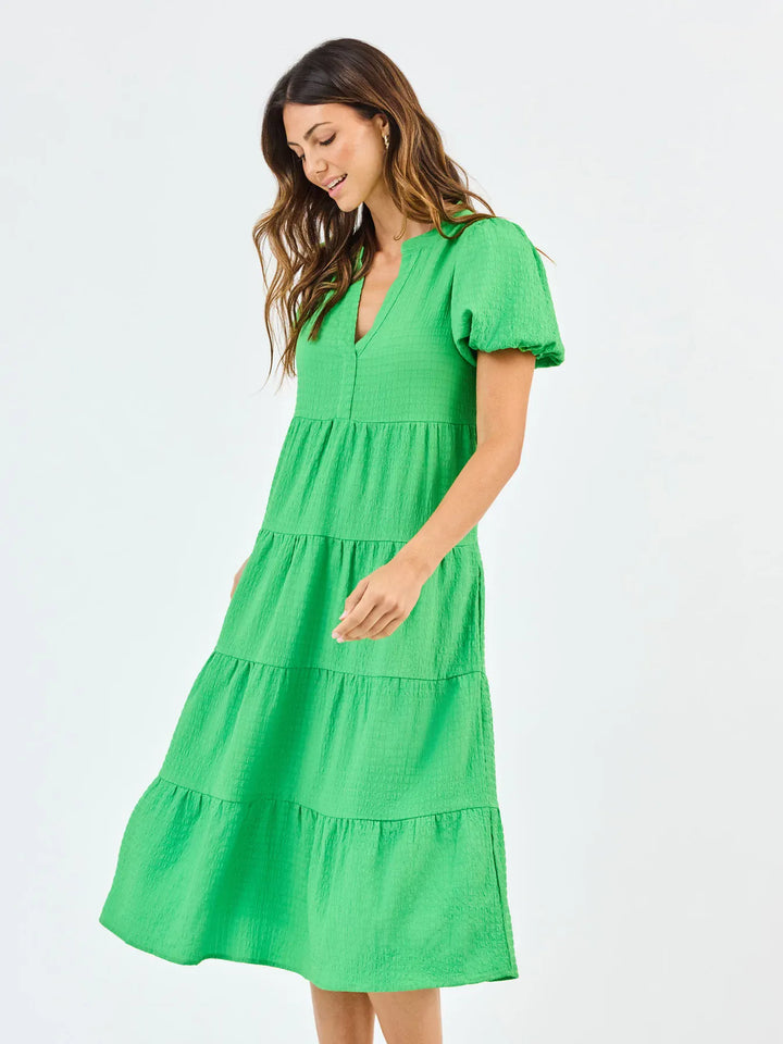 Mary Square Kinsley Midi Dress featuring a flowy silhouette and stylish design, perfect for casual or dressy occasions.