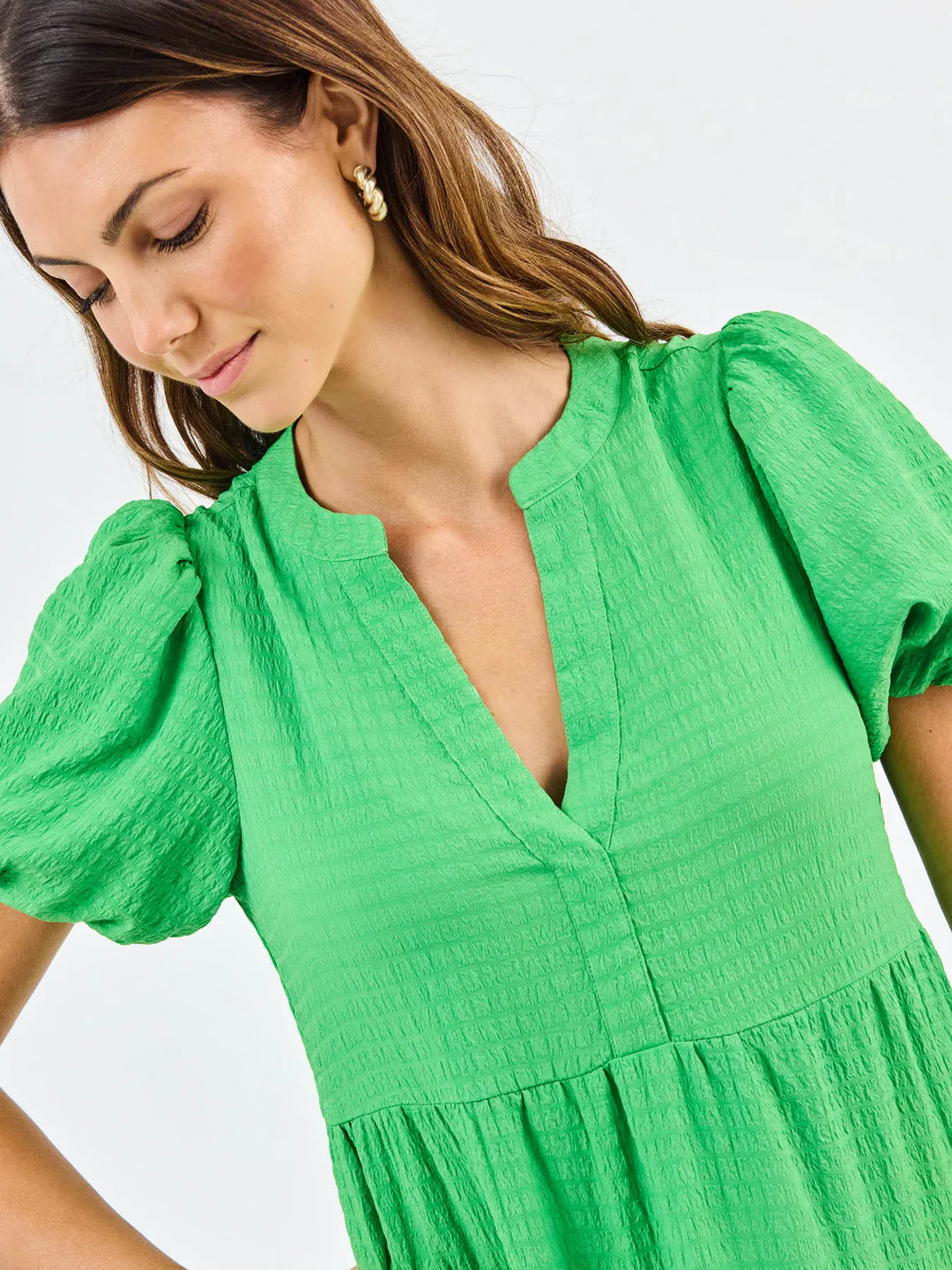 Mary Square Kinsley Midi Dress featuring a flowing fabric, sleeveless design, and floral pattern, perfect for casual or semi-formal occasions.