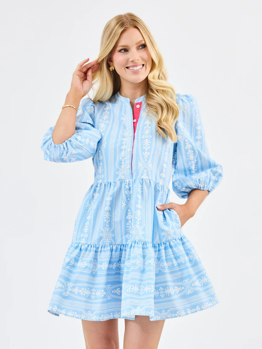 Mary Square Riley Mini Dress featuring a stylish, fitted design with floral patterns, perfect for casual or semi-formal occasions.