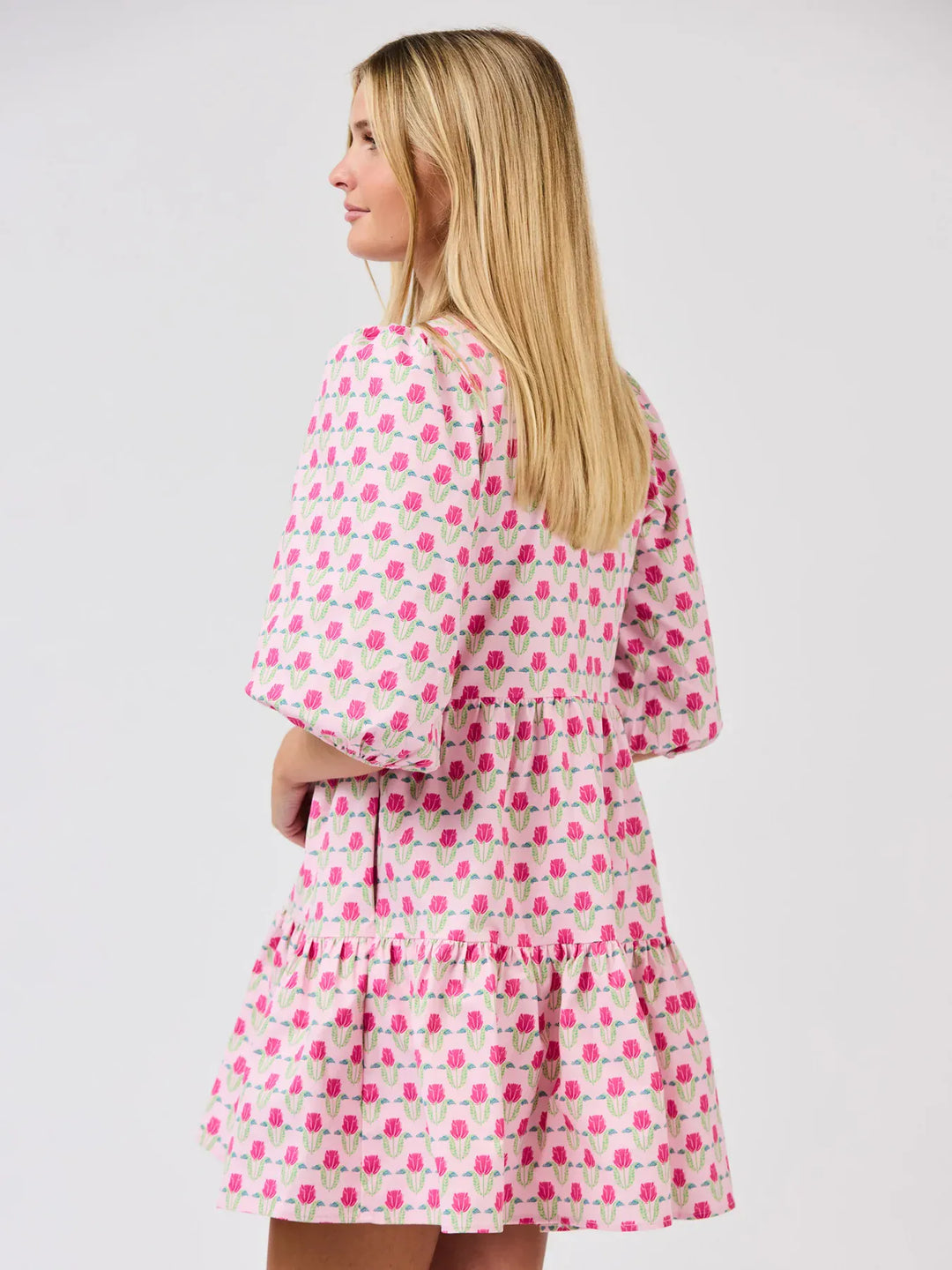 Mary Square Riley Mini Dress featuring a stylish, casual design with a floral pattern and short sleeves.