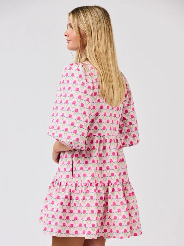 Mary Square Riley Mini Dress featuring a stylish, casual design with a floral pattern and short sleeves.
