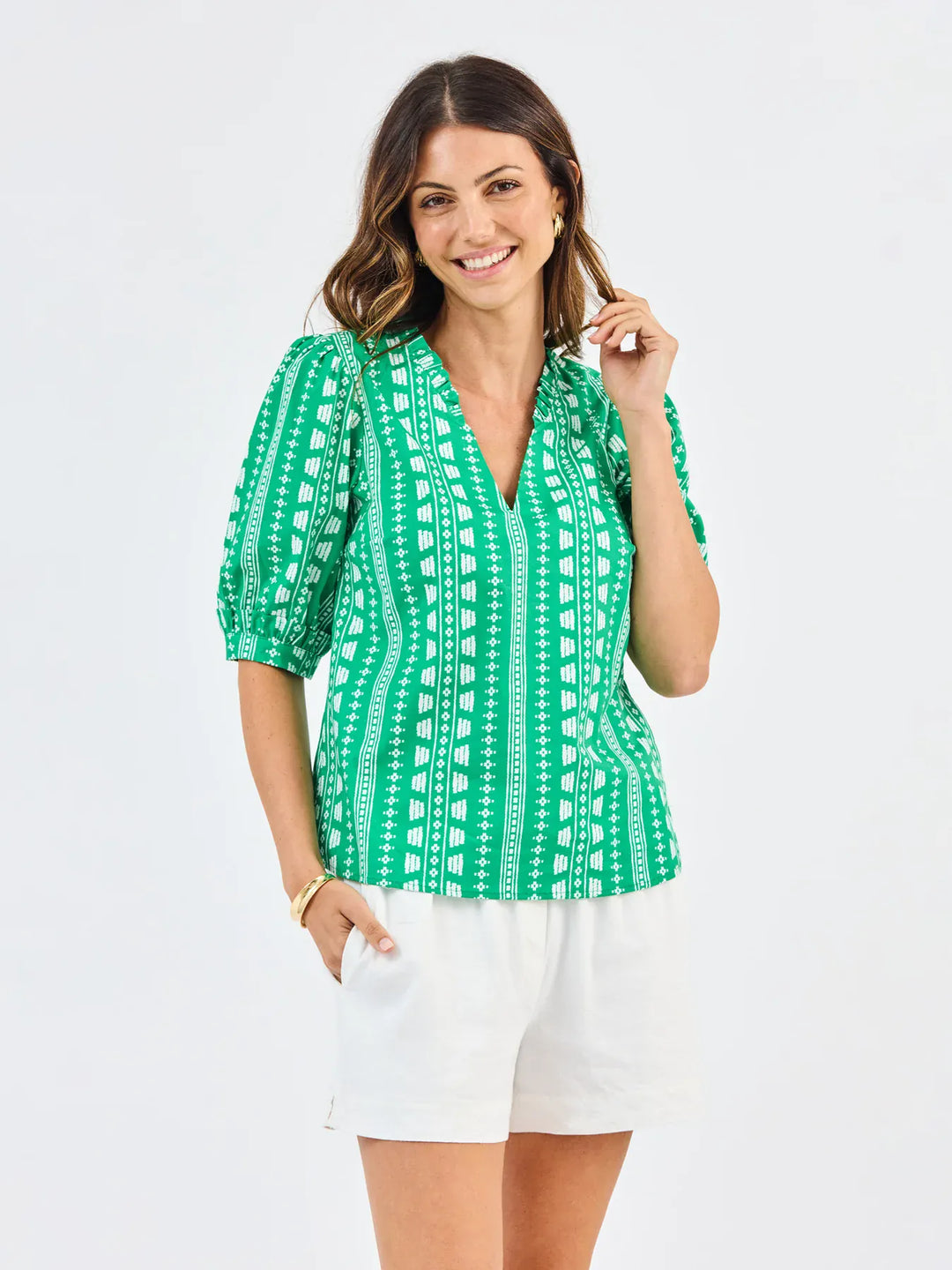 Mary Square Colette Top in green featuring heritage stitch details and a stylish, casual design.