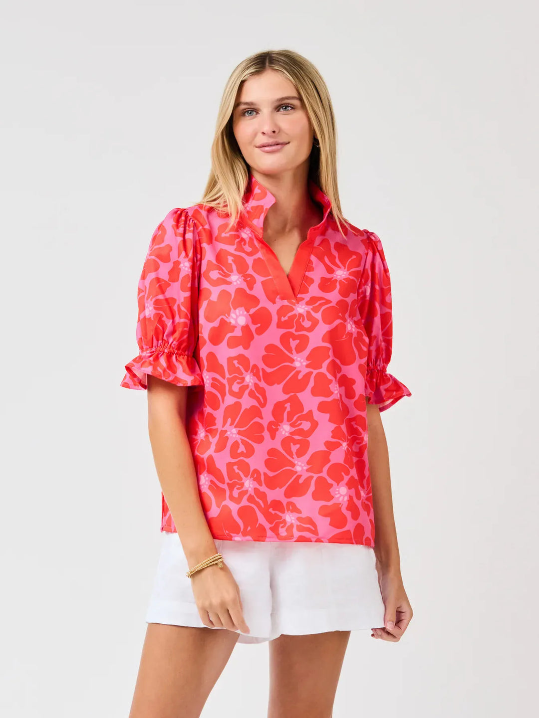 Mary Square Jessica Top displayed on a hanger, featuring a stylish sleeveless design with a vibrant pattern and soft fabric.