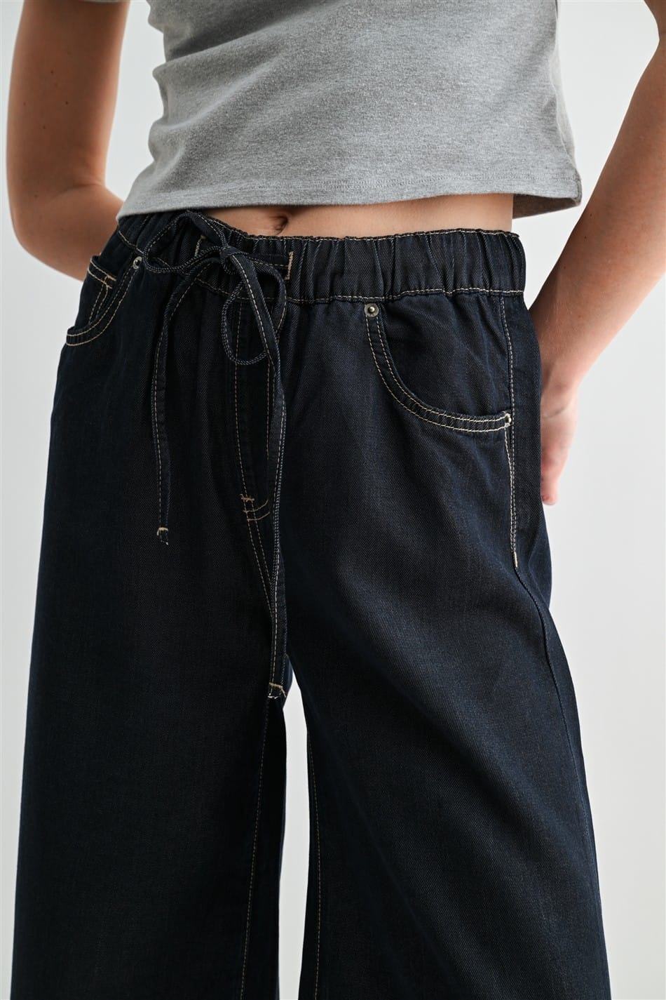 Mica Denim Leah Wide Leg Joggers in denim fabric, relaxed fit with wide legs, stylish casual pants for women.