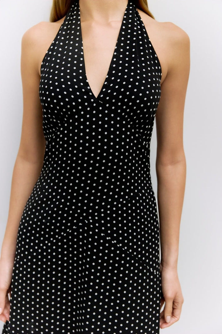 Elegant MOD REF Angelina Maxi Dress with flowing fabric and a stylish silhouette, perfect for summer or special occasions.