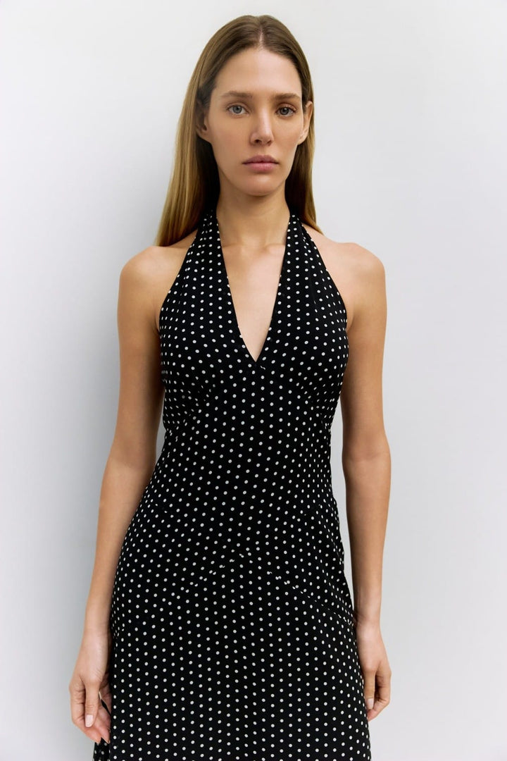 Elegant MOD REF Angelina Maxi Dress with flowing fabric and stylish design, perfect for casual or formal occasions.