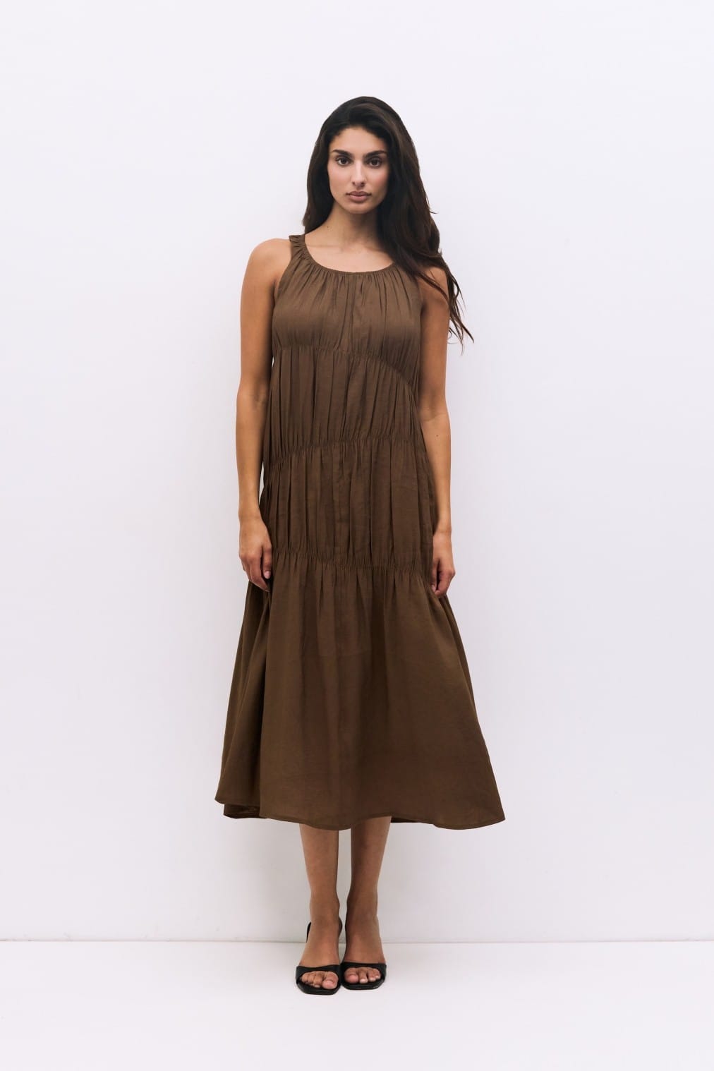 Brown MOD REF Vittoria midi dress, front view showing elegant V-neck and flowy fabric suitable for casual or semi-formal wear.