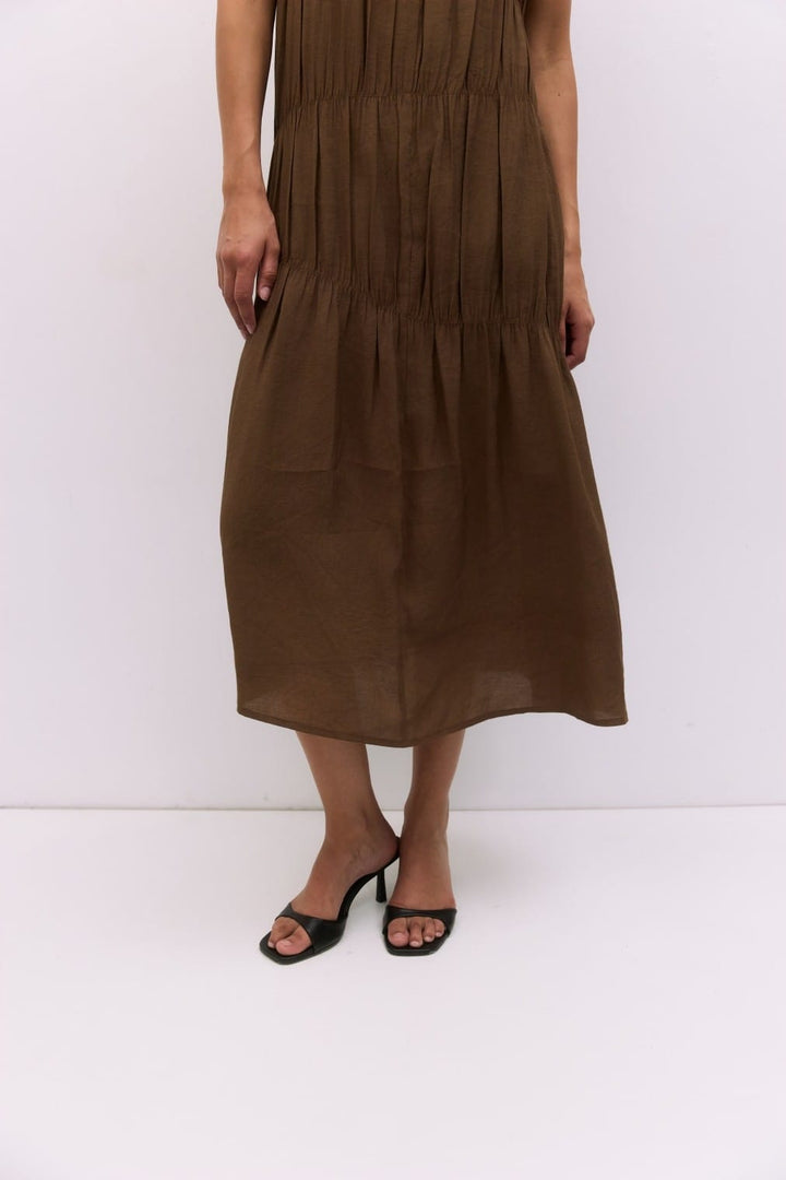 MOD REF Vittoria midi dress featuring a stylish, flowing design with a fitted waist and elegant hemline.