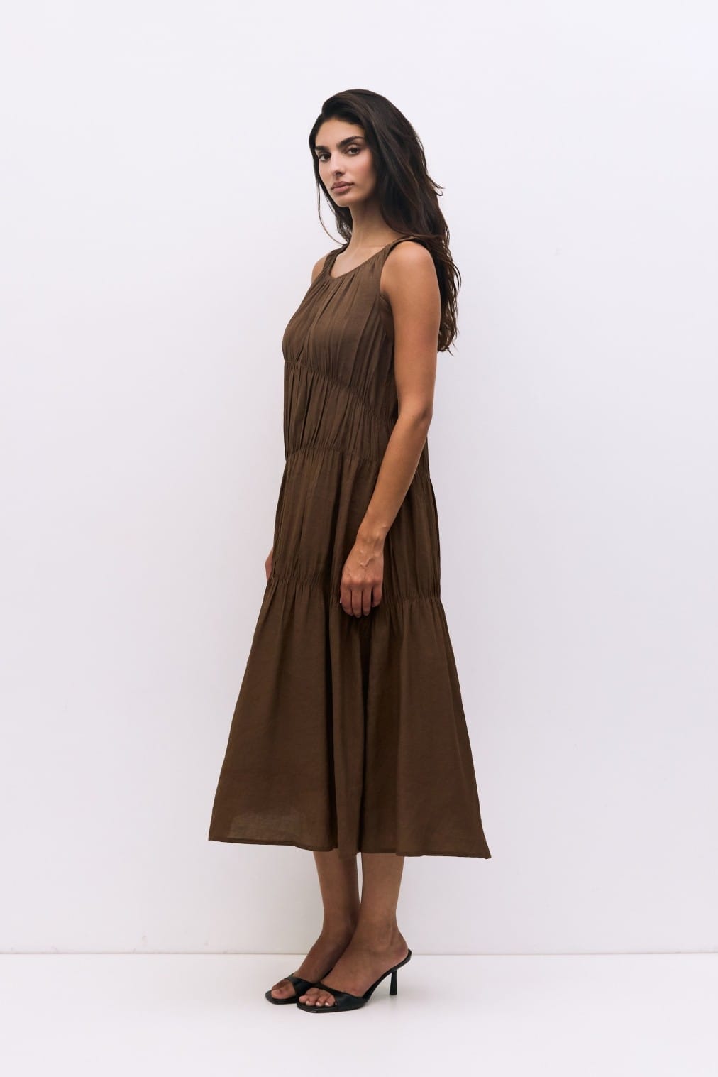 Light blue Vittoria midi dress by MOD REF, featuring a flowy fabric and elegant design, perfect for casual or semi-formal occasions.