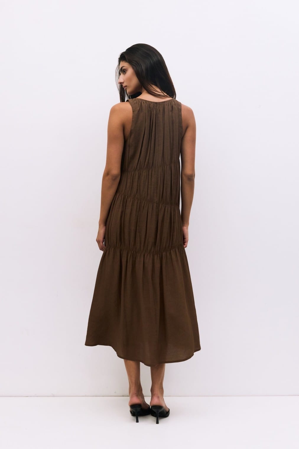 MOD REF Vittoria midi dress featuring a stylish, flowy design with a fitted waist and elegant neckline.