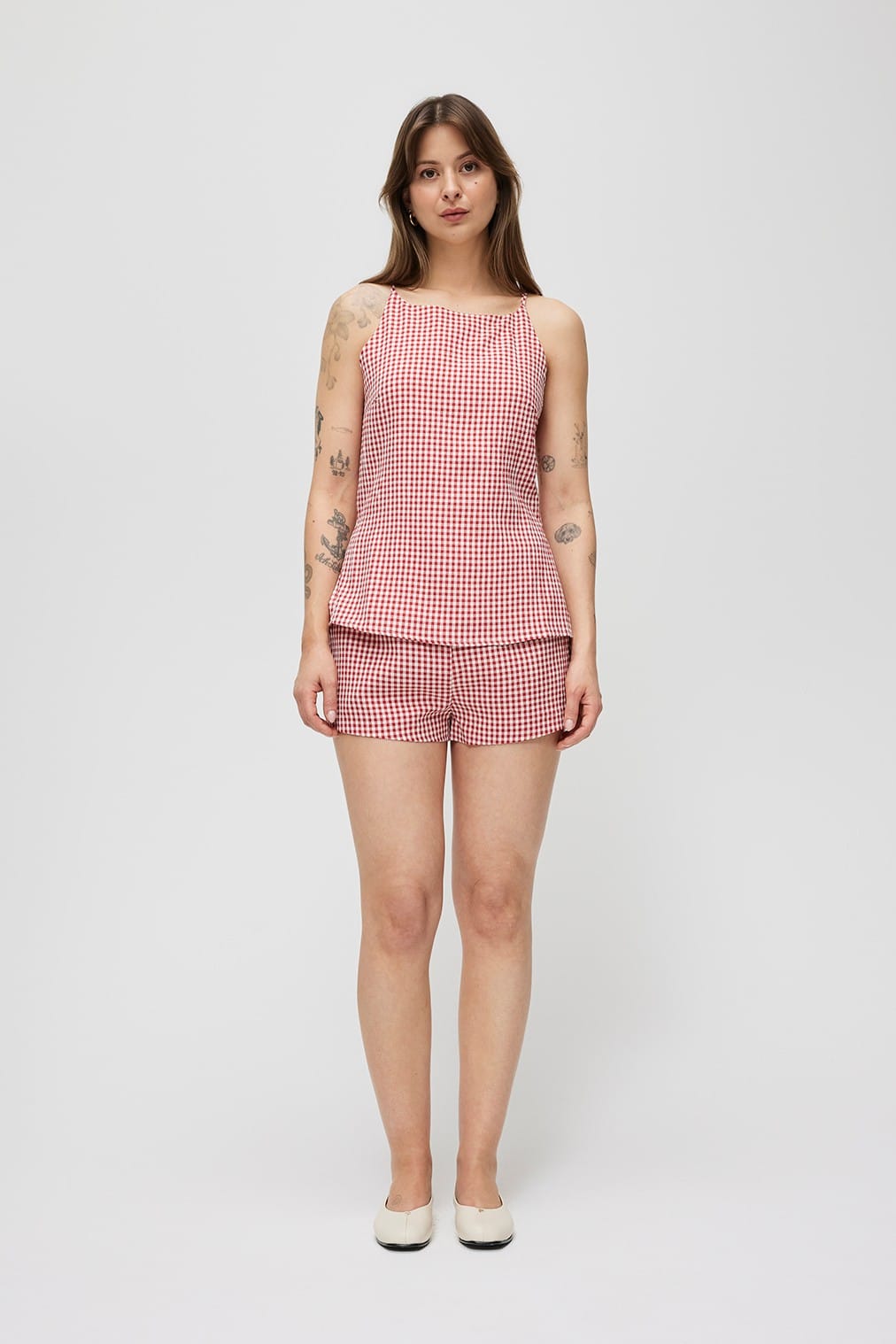 Light blue Madeline Shorts by MOD REF, casual denim shorts with a relaxed fit and distressed details, shown on a model.