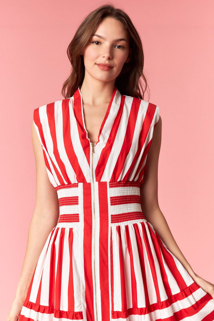 Eliza striped maxi dress by Peach Love California featuring a flowing silhouette and bold vertical stripe pattern.